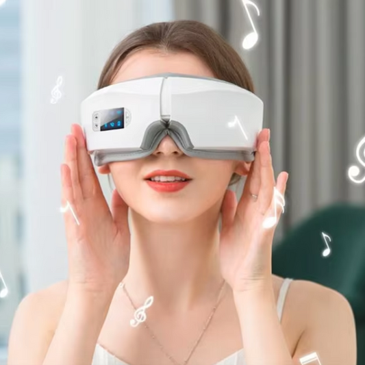 Woman wearing a white eye massager with a blurred background