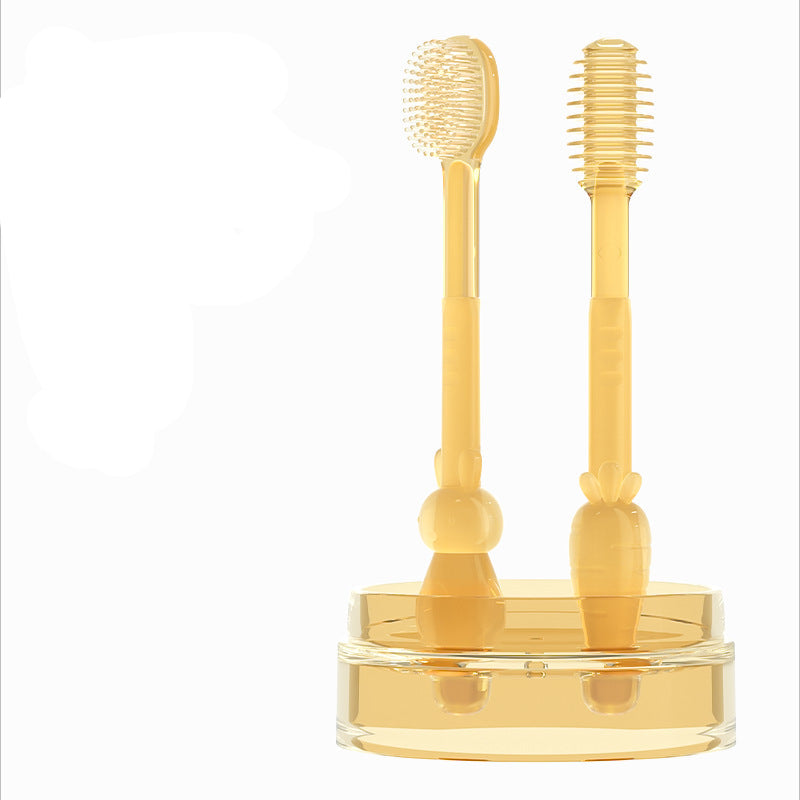 Two baby toothbrushes with a stand on a white background.