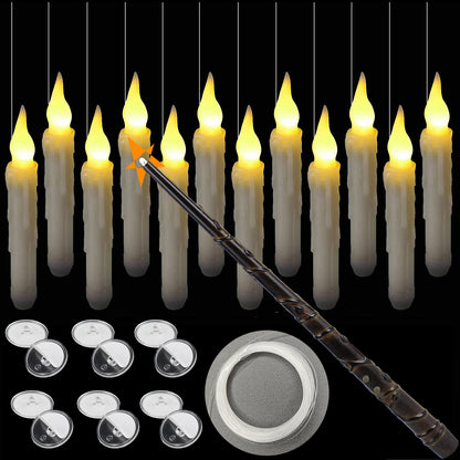 Set of LED floating candles with a wand and candle holders on a black background