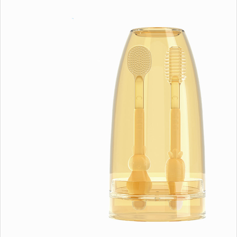 Transparent yellow container with two baby toothbrushes inside.